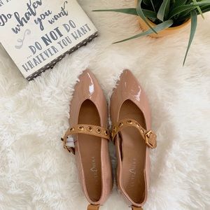 Nude pink flats with adjustable strap